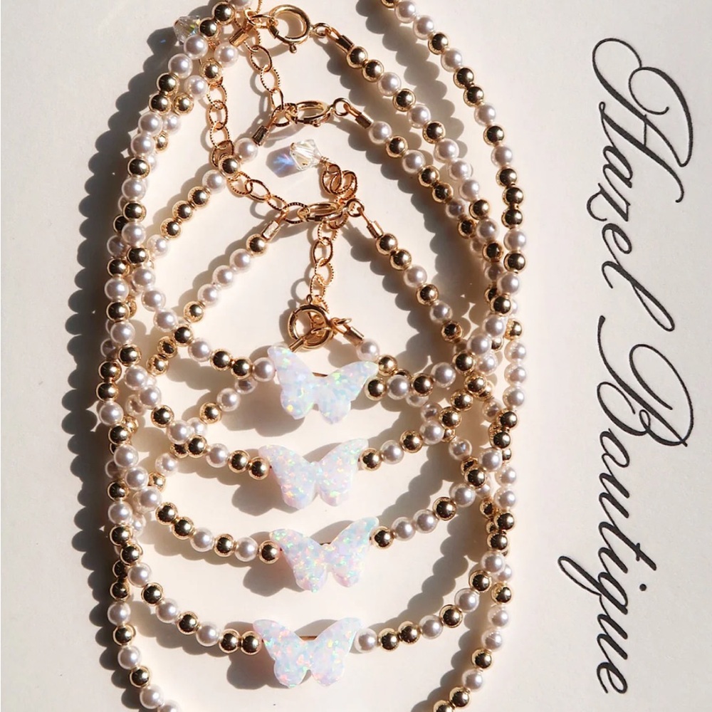 Hazel boutique gold and pearls butterfly bracelet